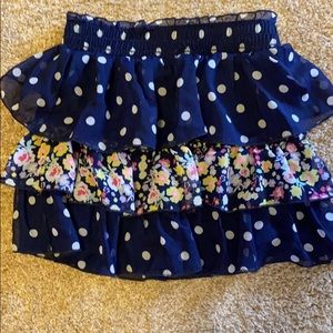 All three!!size 7 two skirts one swimsuit coverup